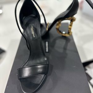 Never worn Dolce & Gabbana black/gold heels